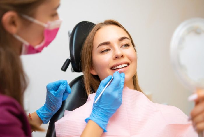 woman-patient-sitting-in-armchair-during-dental-treatment.jpg woman-patient-sitting-in-armchair-during-dental-treatment.jpg